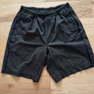 Lululemon Athletica men’s athletic shorts with side stripe, size L